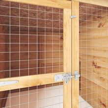 Close-up of galvanised mesh door and latch on dog run